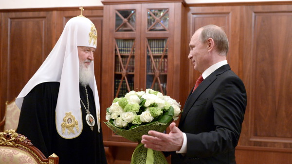 Vladimir Putin, hier am 24. Mai 2015 bei einem Treffen mit Patriarch Kirill von Moskau und ganz Russland | © 2015 keystone tass Alexei Nikolsky
